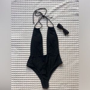 Black open back one piece swimsuit. SIZE: Medium